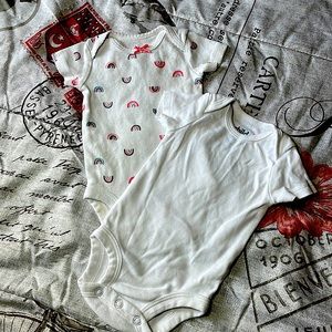 Two cute white newborn onesies from child of mine
